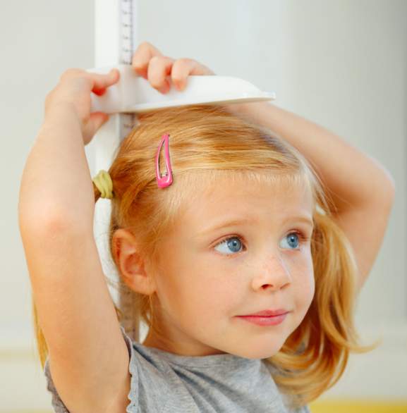 Hva bør være det ideelle høyden og vektmålet for barn?