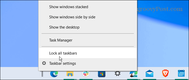 låse alle oppgavelinjer midt i Windows 10-oppgavelinjen