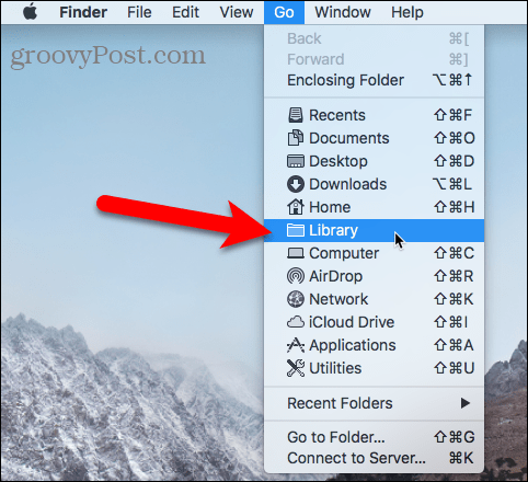 Åpne bibliotekmappen ved å bruke menyen Gå i Finder på Mac